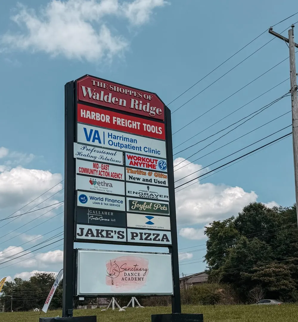 The Shoppes of Walden Ridge sign with the Sanctuary Dance Academy panel